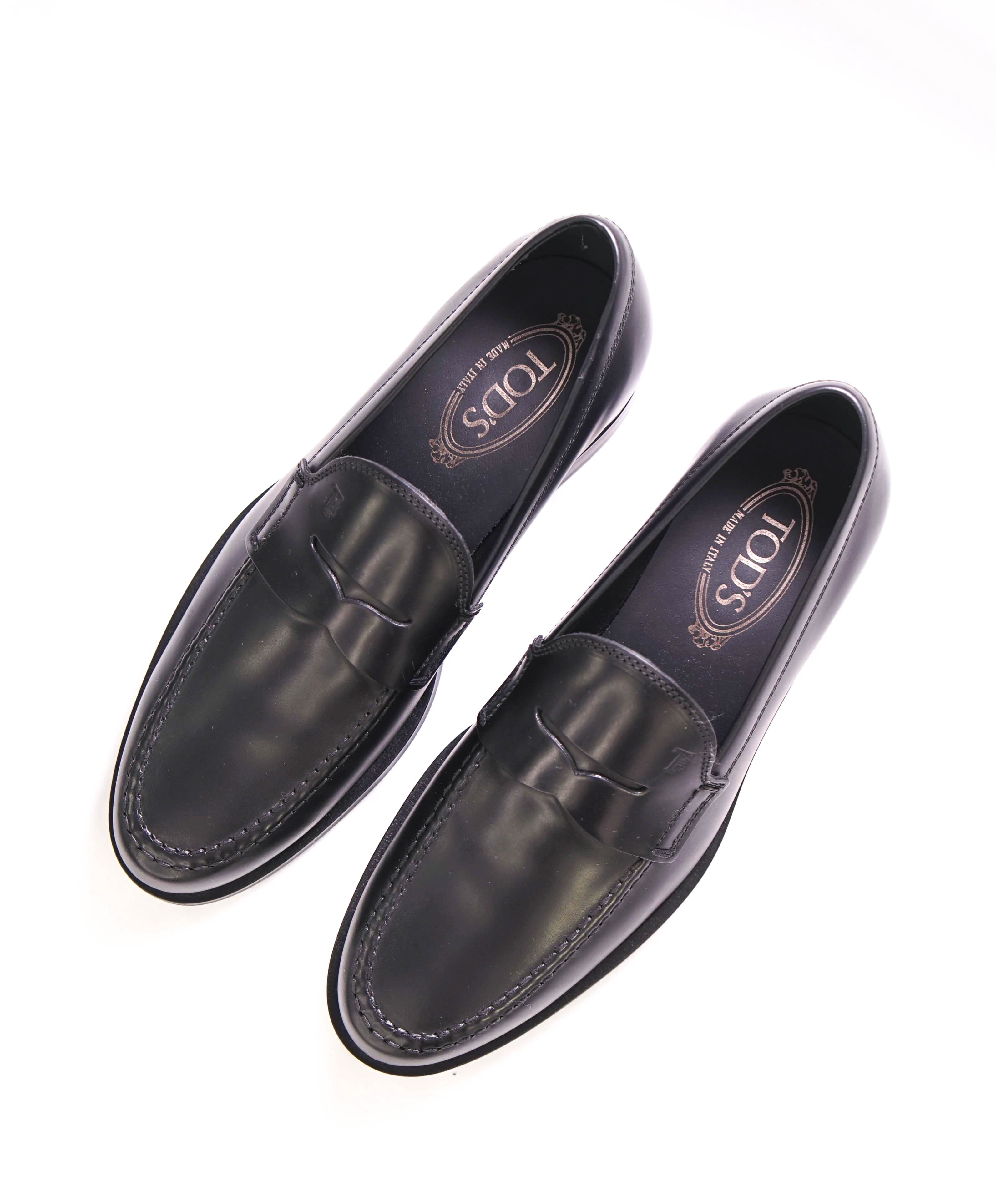 TOD’S - “Boston” Black Logo Embossed Vamp Penny Loafers - 7.5 US