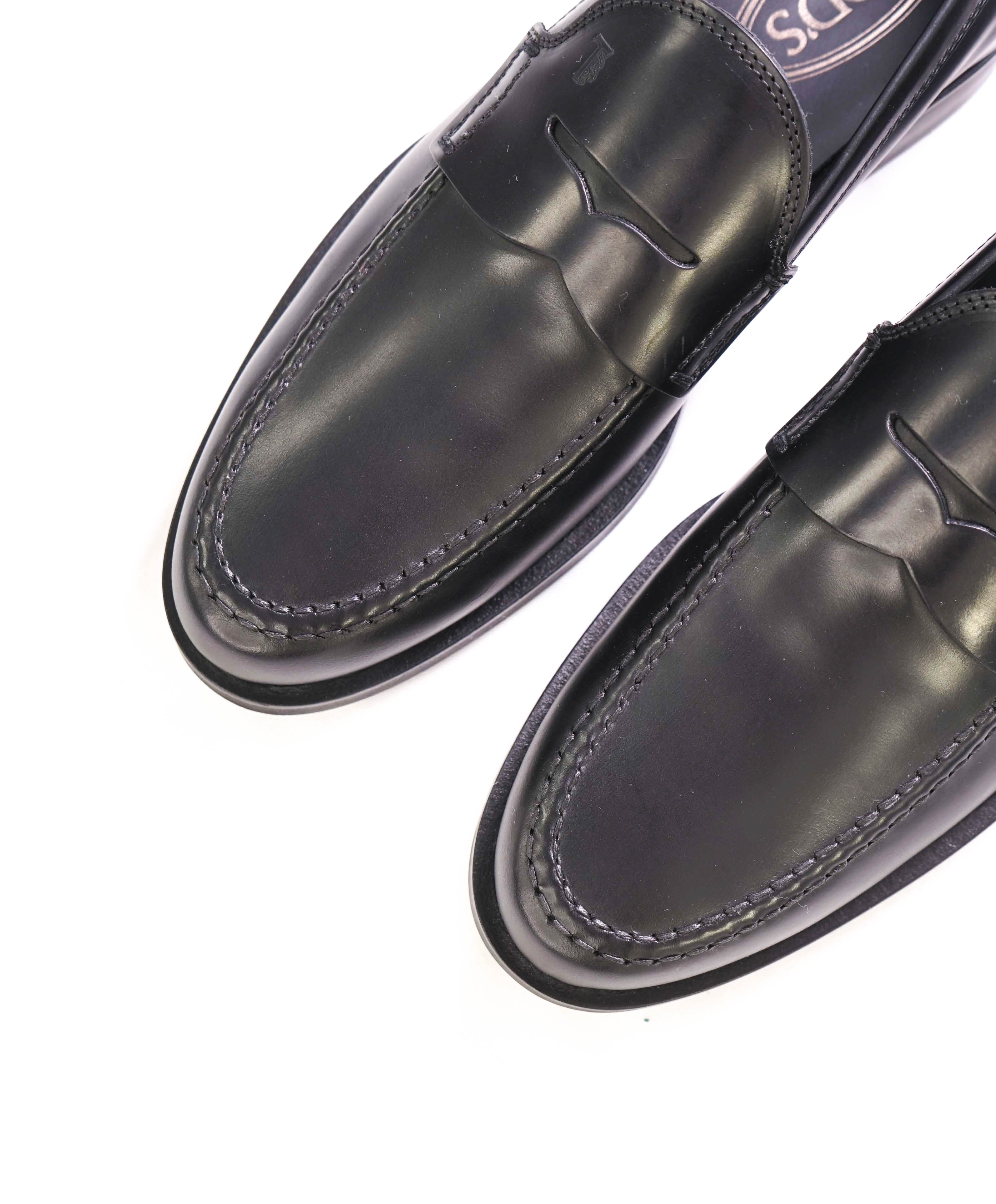 TOD’S - “Boston” Black Logo Embossed Vamp Penny Loafers - 7.5 US