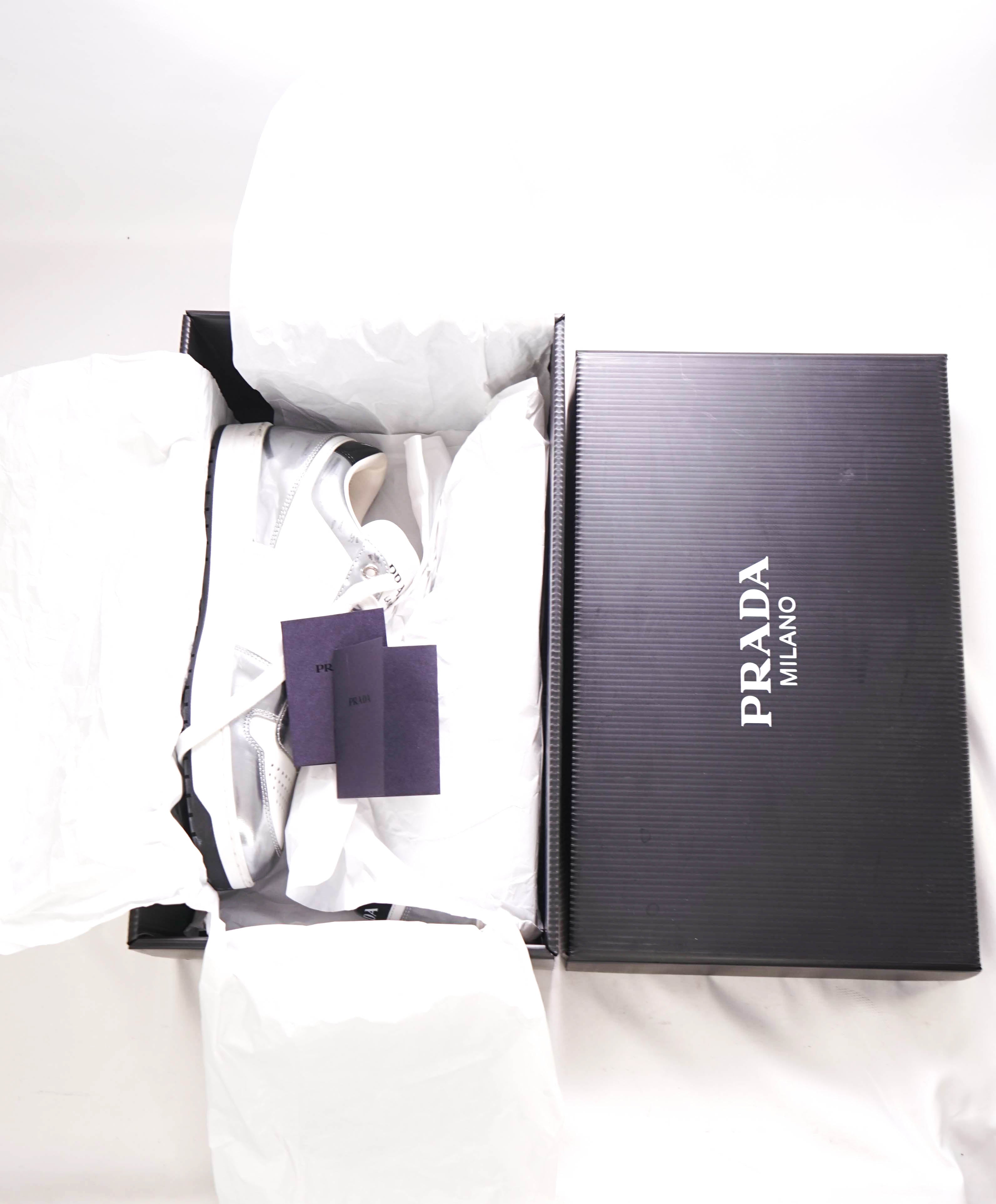 $1,100 PRADA - "DOWNTOWN" White/Silver Leather Sneakers With Logo Detail - 7 US (6 IT)