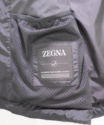 $2,495 ZEGNA - Black Quilted Logo Tab Vest - M