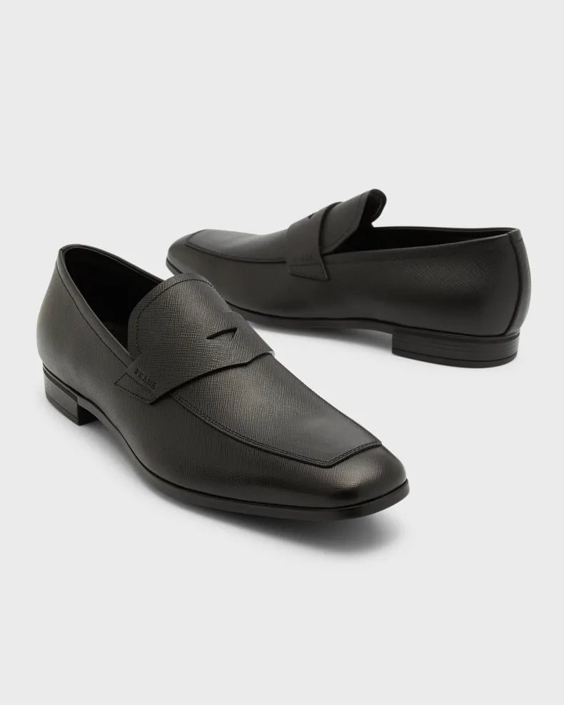 $875 PRADA - Asymmetrical Saffiano Leather Logo Penny Loafers Black - 9.5US (8.5UK)