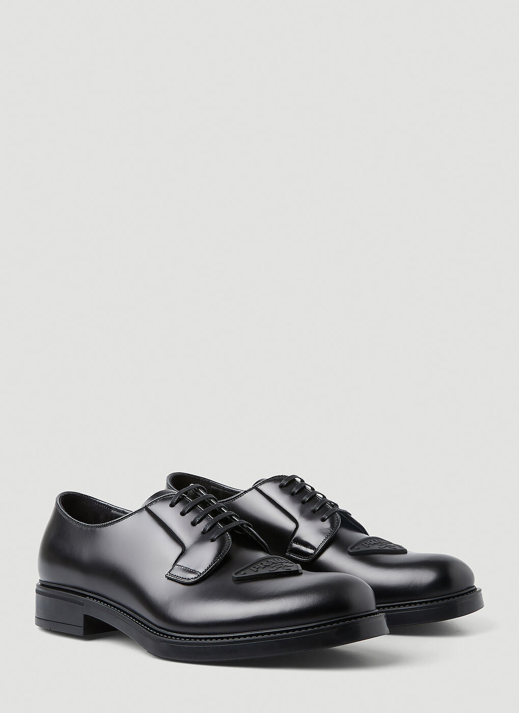 $1,150 PRADA - Black Brushed Triangle Plaque Leather Derby Lace-Ups - 11 US (10 Prada)