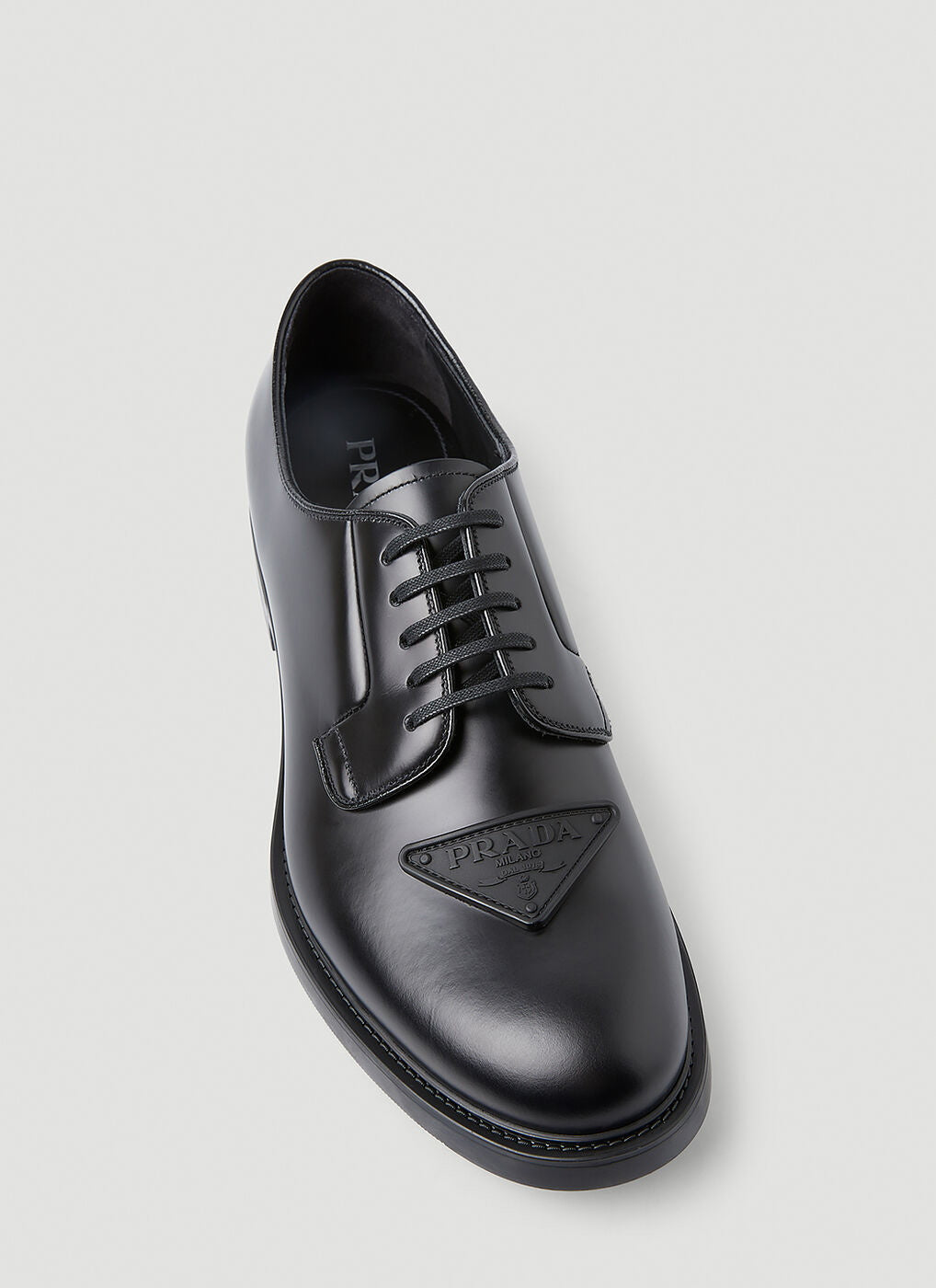 $1,150 PRADA - Black Brushed Triangle Plaque Leather Derby Lace-Ups - 11 US (10 Prada)