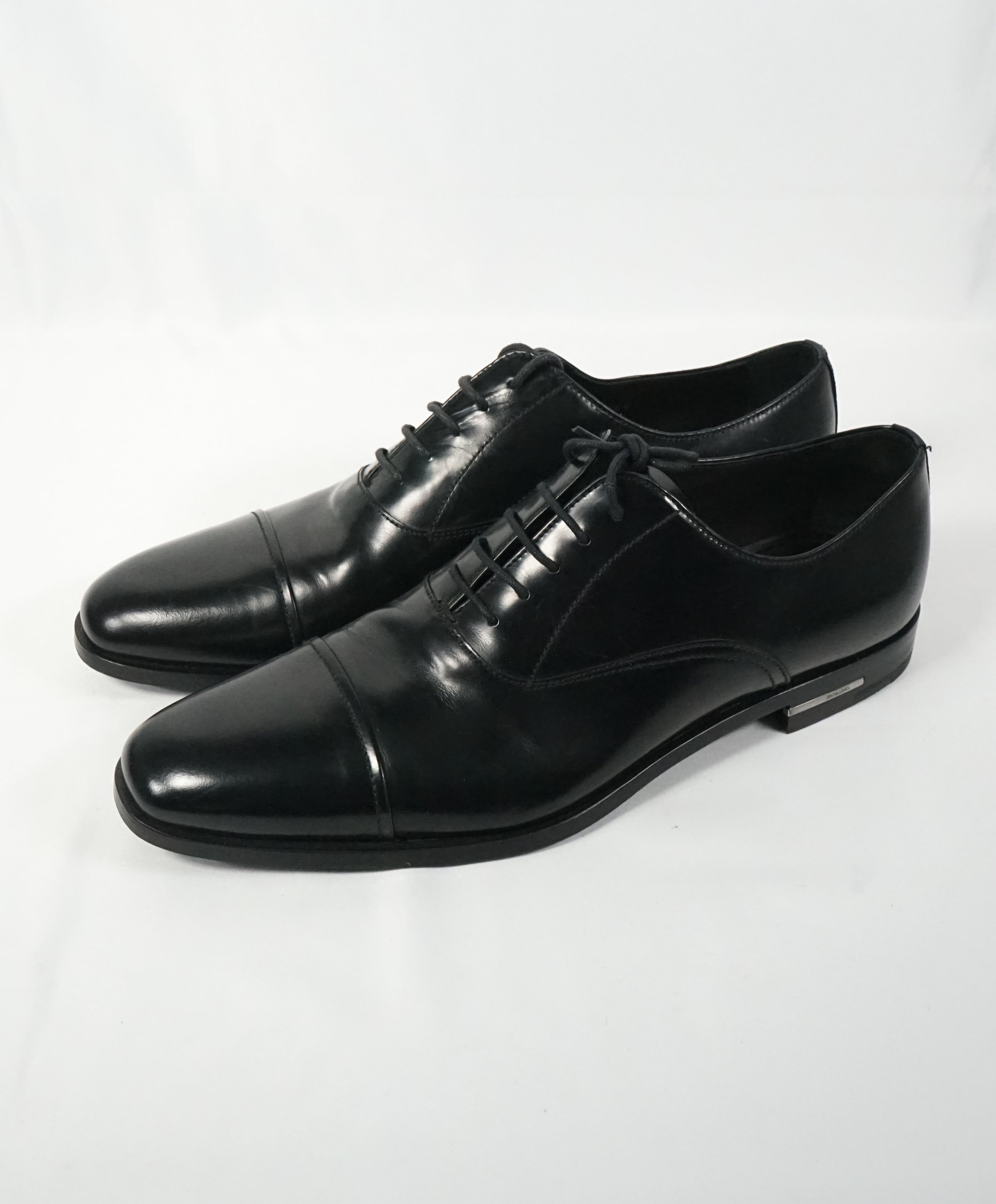 PRADA - Leather Cap Toe Spazzolato Oxfords With Logo Inset Heel - 9